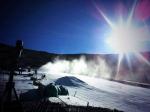 View of the slopes with the snow machine